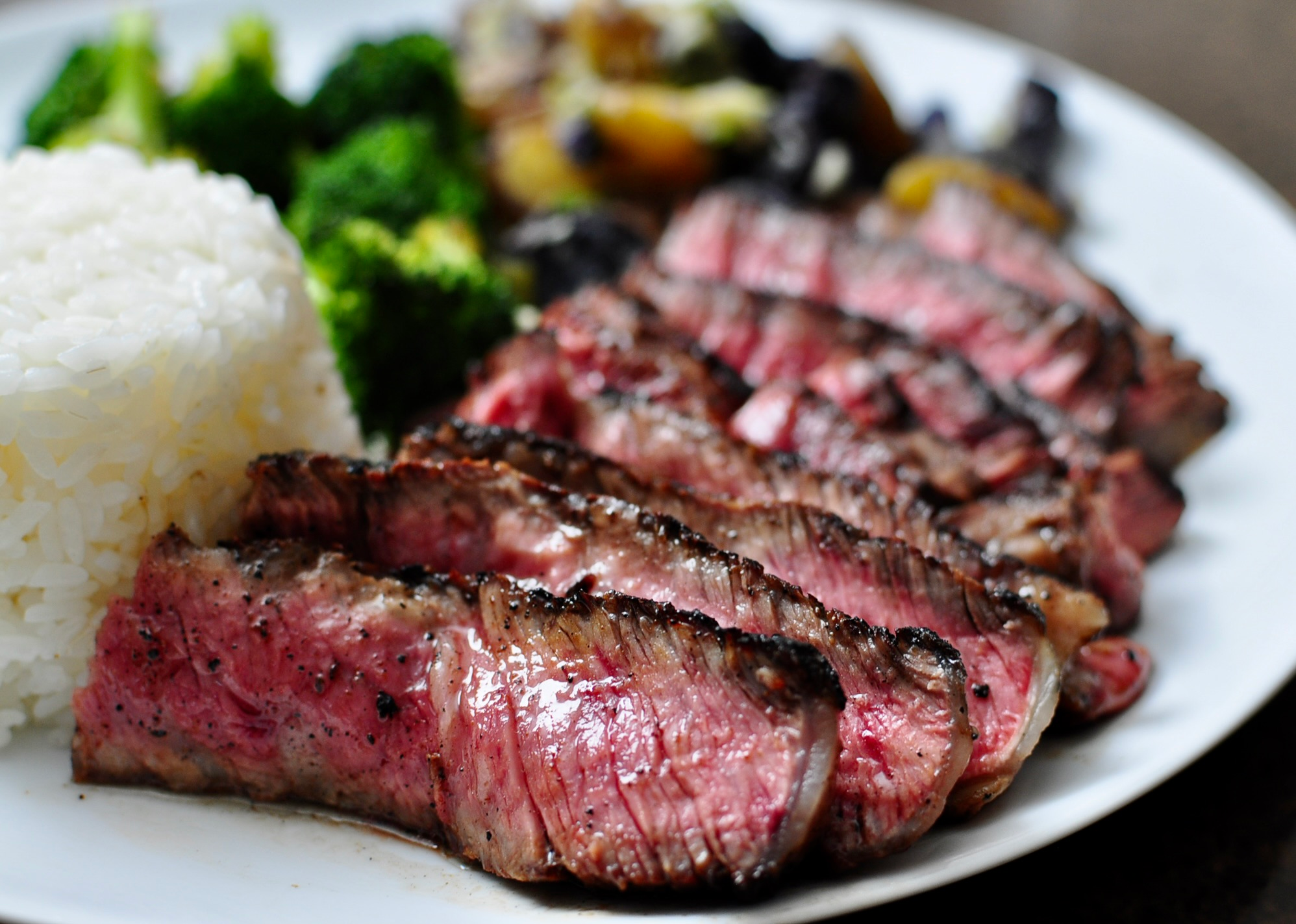 Bone-in rib eye medium rare sliced steak