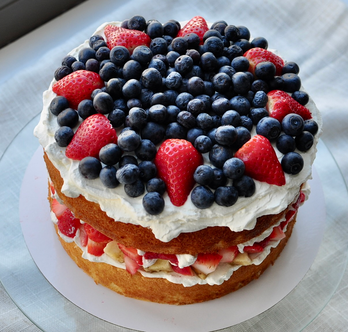 Chinese bakery style sponge cake with whipped cream and fruit