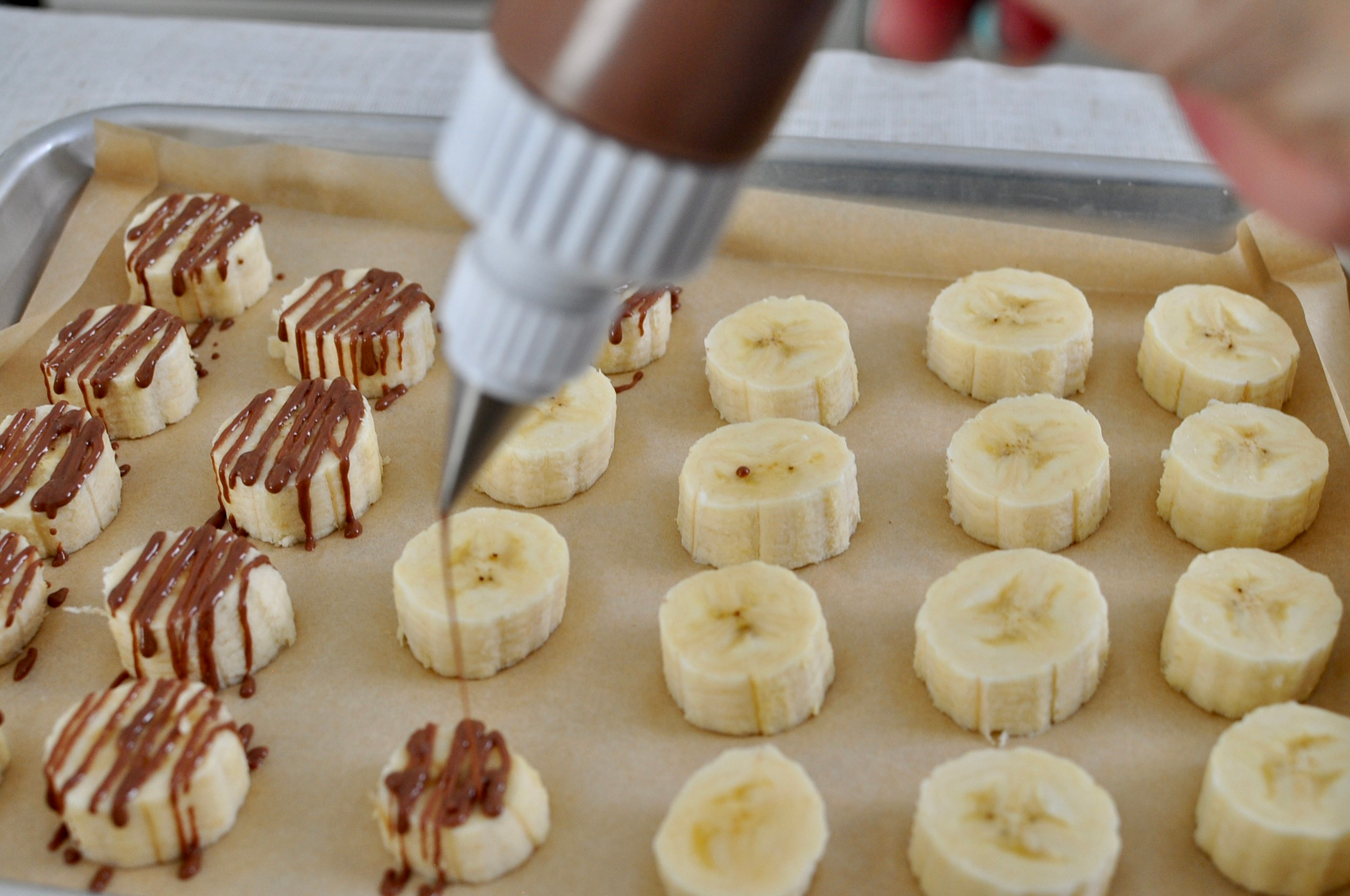 Chocolate drizzle on bananas