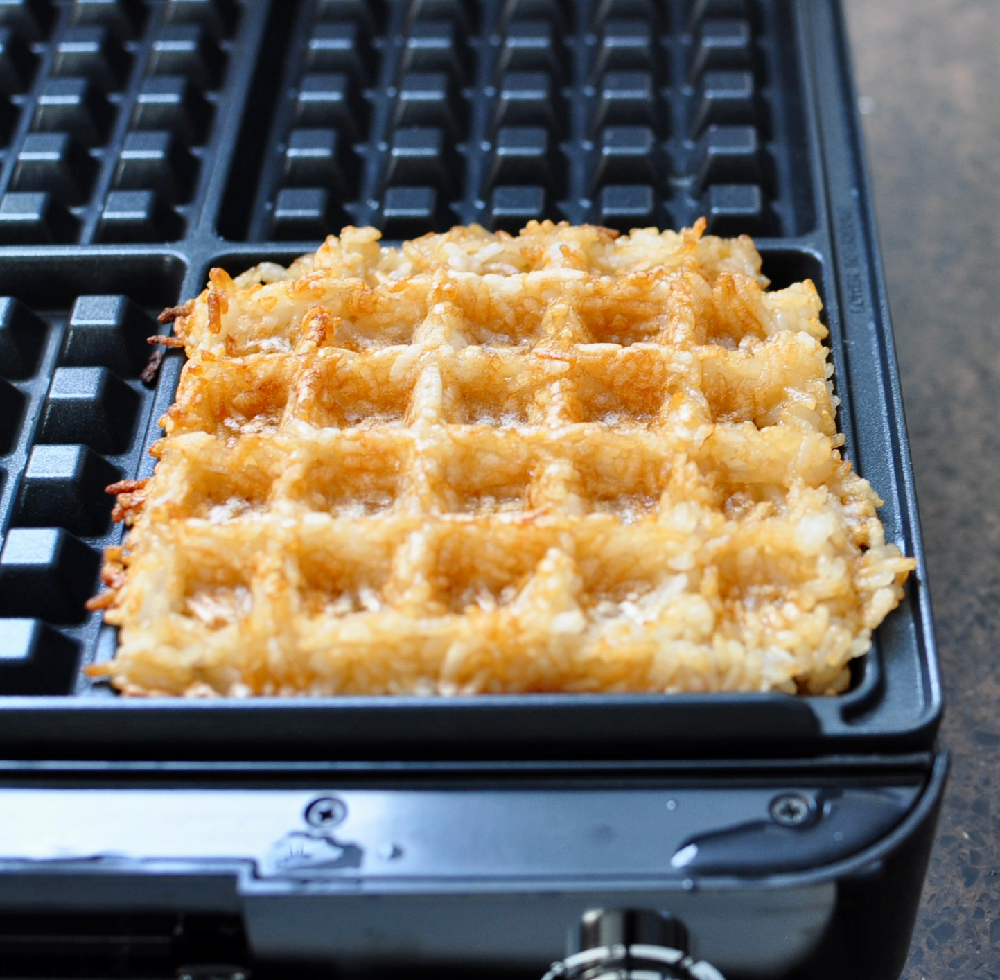 Rice waffle on a waffle iron