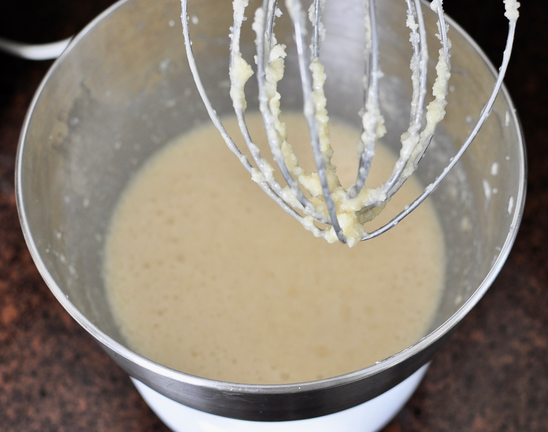 Vanilla cake batter in mixing bowl