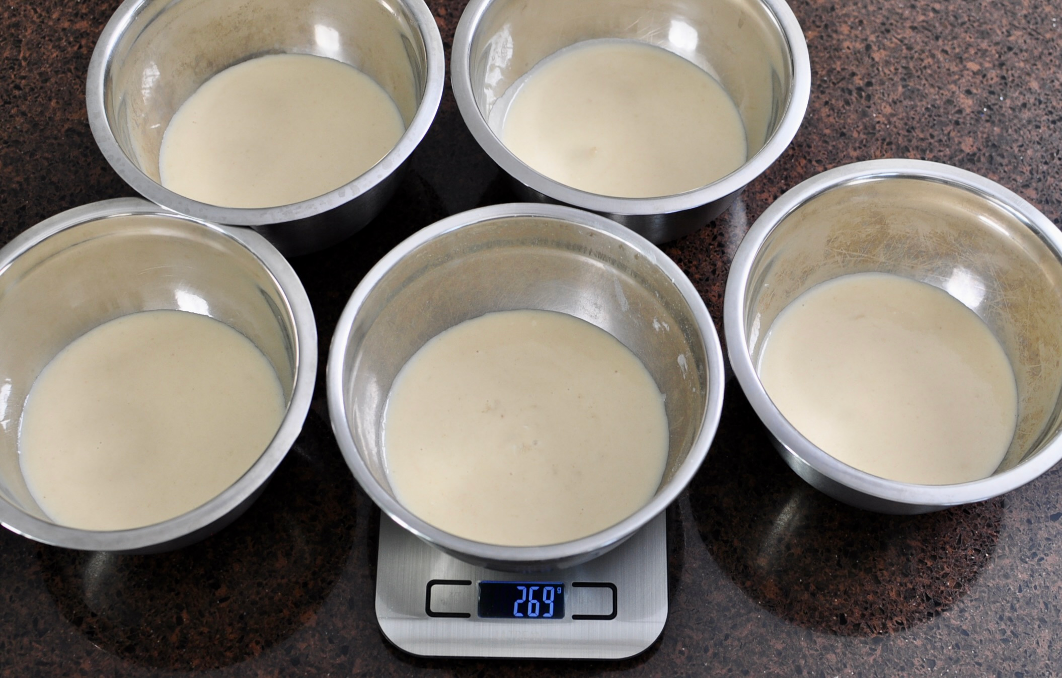 Vanilla cake battered divided evenly