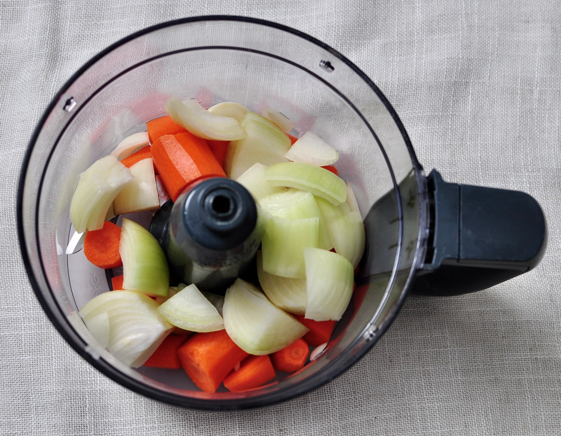 Onions, Carrots and Garlic Chopped in Food Processor
