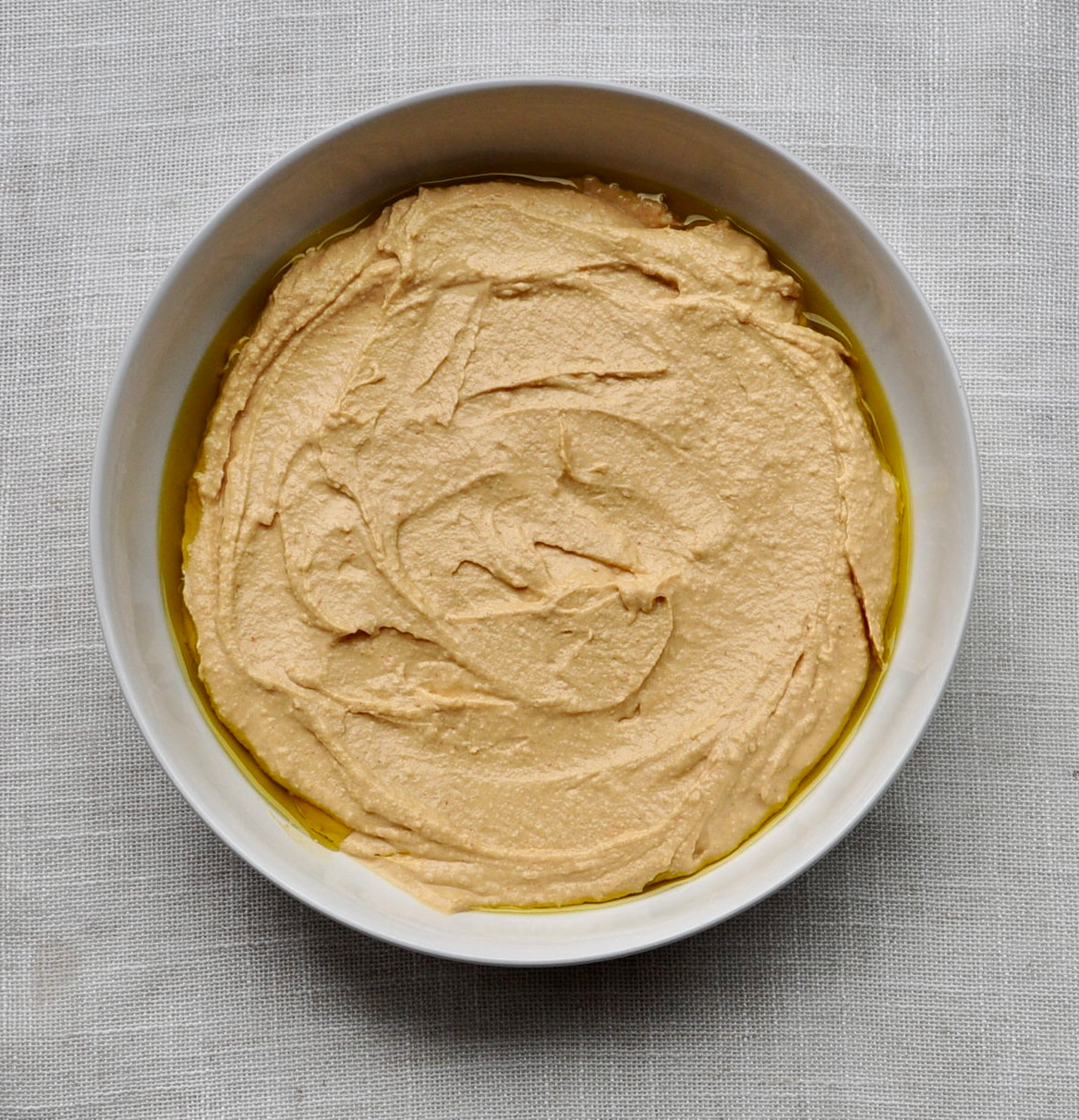 Hummus Dip Layered with Sweety Drops and Olives