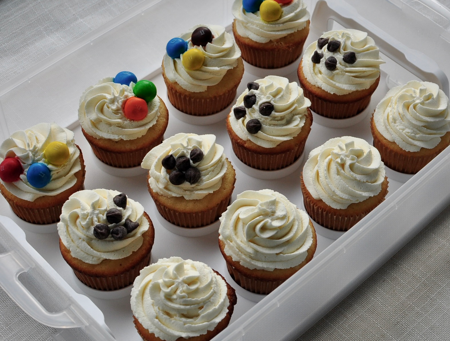 Moist Vanilla Cupcakes with Whipped Cream Frosting