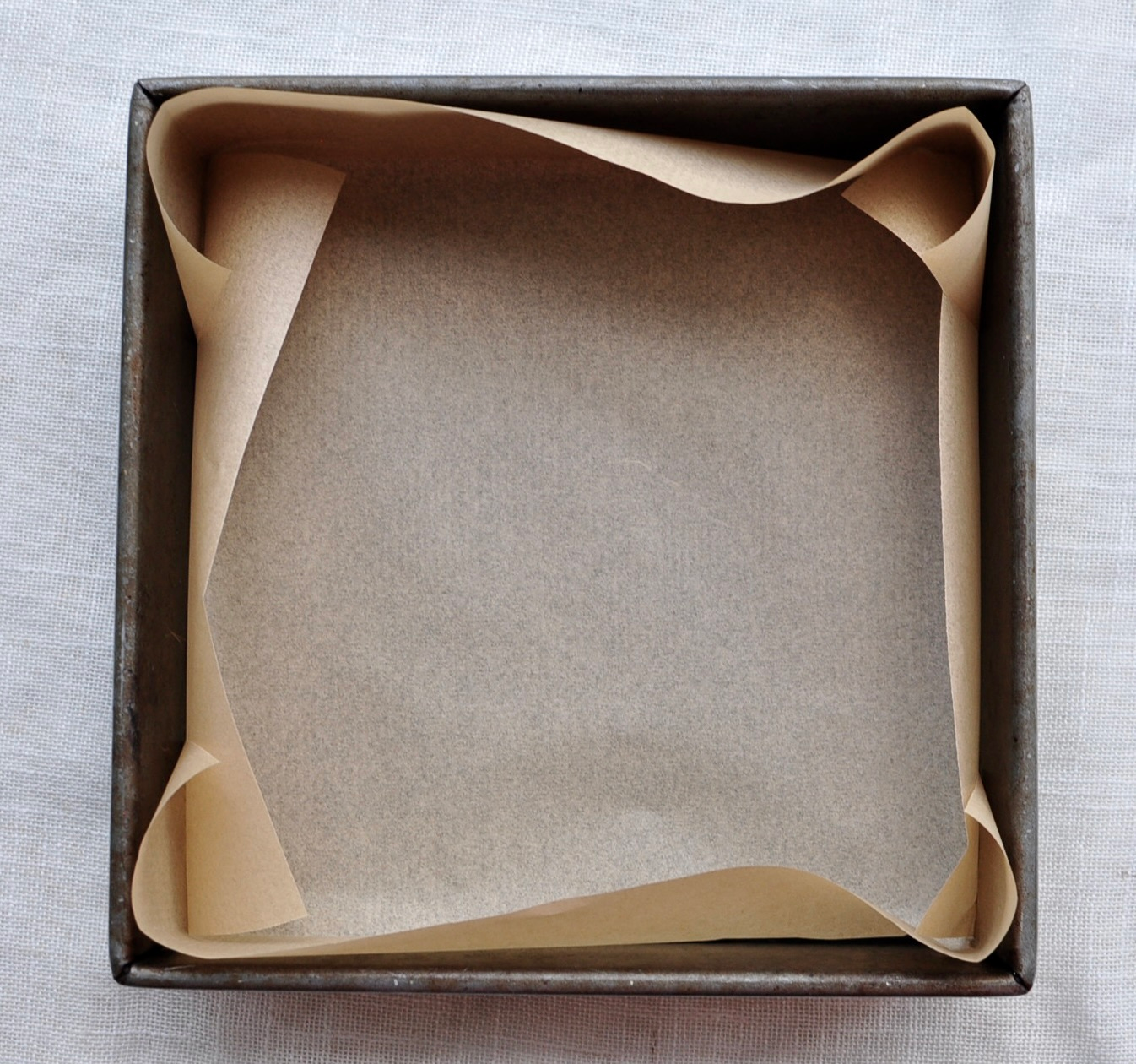 parchment lined brownie pan for black sesame brownies