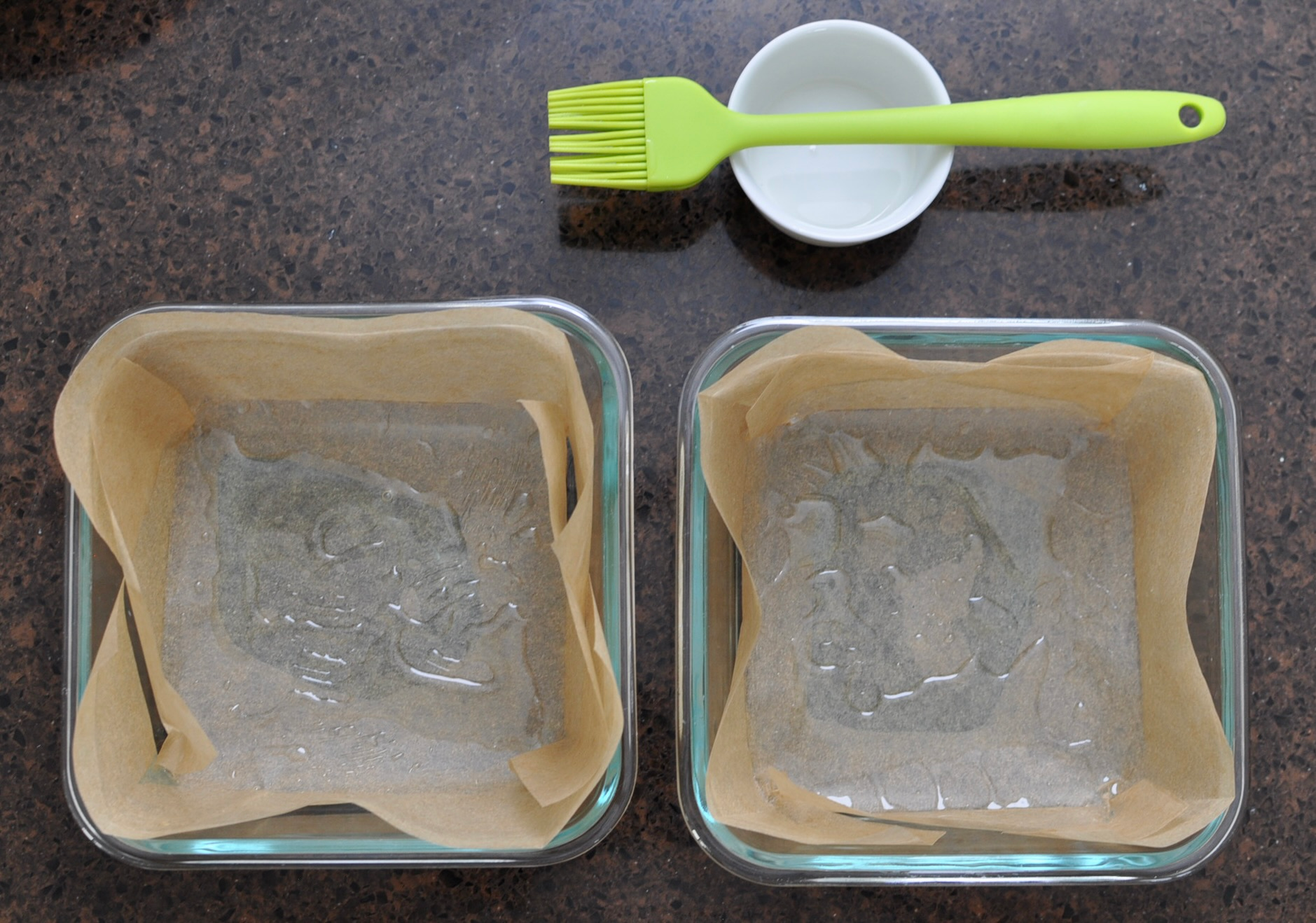 Parchment Lined and Greased Pans for Steamed Mochi Squares
